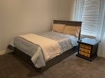 Guest bedroom with full size bed and trundle